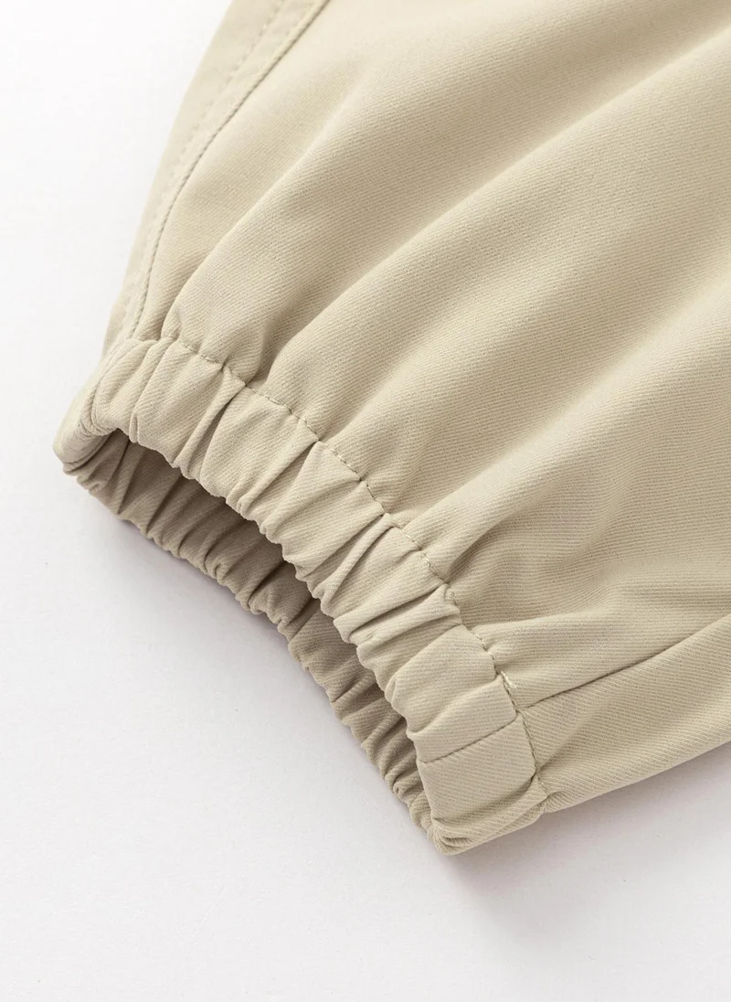 Balabala Beige Toddler Unisex Woven trousers  | Best Price UAE